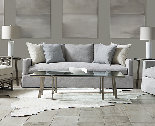 Grey leather sofa in white living room