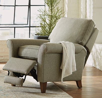 Side view of a recliner, reclined in a living room