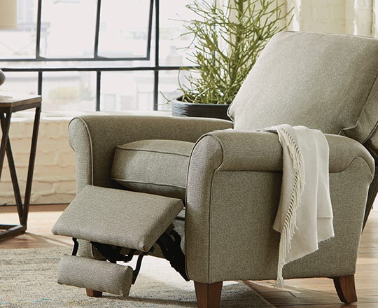 Contemporary recliner in beige fabric