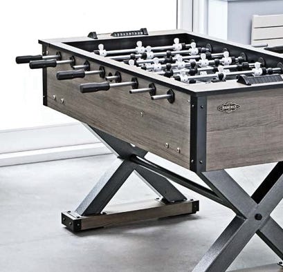 Foosball table in a room