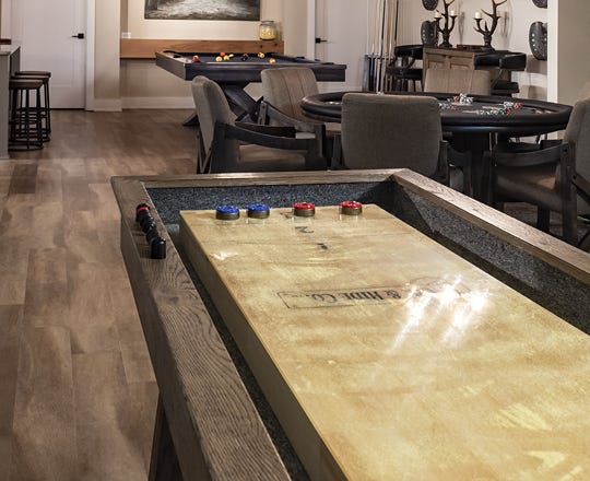Top down view of a shuffleboard table play area