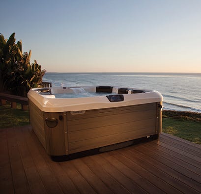 Spa on patio overlooking lake